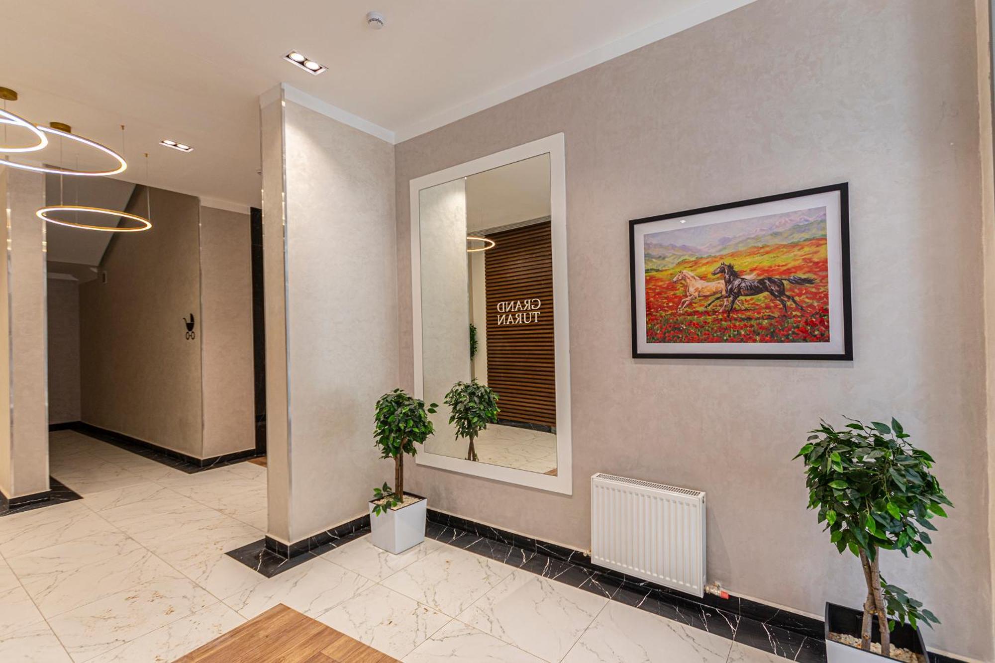 Raisson Aparthotel G84 Хан Шатыр Astana Bagian luar foto