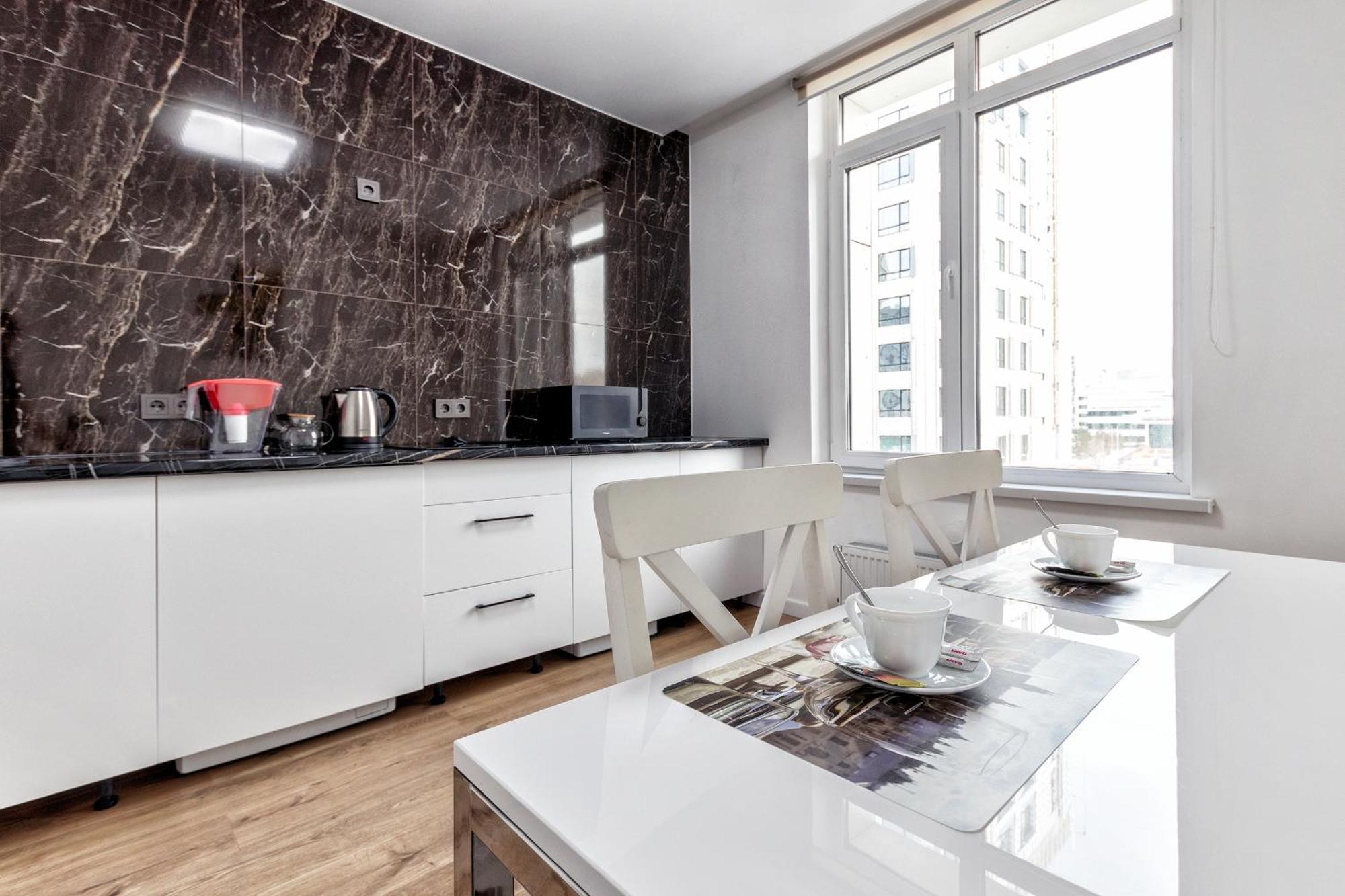 Raisson Aparthotel G84 Хан Шатыр Astana Bagian luar foto